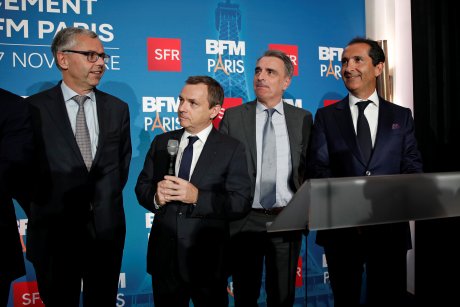 Michel Combes, directeur général de SFR, Alain Weill, directeur général de SFR Media, Michel Paulin, directeur général de SFT Telecom et Patrick Drahi, patron d'Altice, lors du lancement de BFM Paris le 7 novembre 2016