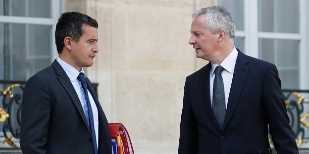 Le ministre des Comptes publics Gérard Darmanin et le ministre de l'Économie Bruno Le Maire dans la cour de l'Élysée, ce 24 septembre.