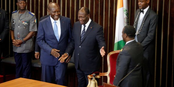 (De g. à d., premier plan) Daniel Kablan Duncan, vice-président de la Côte d'Ivoire ; Alassane Ouattara, le président ivoirien ; et Guillaume Soro, président de l'Assemblée, le mardi 10 janvier 2017 au siège de l'Assemblée nationale ivoirienne.