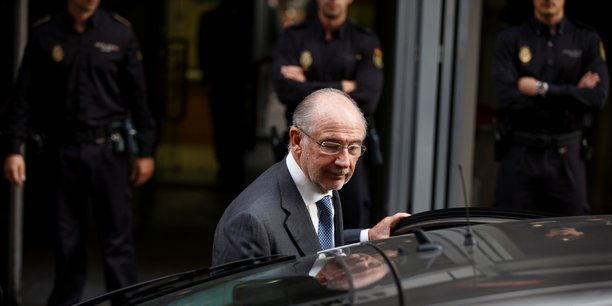 Rato leaves the high court after being questioned by a judge investigating the alleged use of caja madrid credit cards for personal expenses in madrid[reuters.com]
