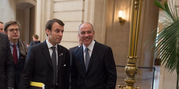 Emmanuel Macron, alors secrétaire général adjoint de l'Elysée, et Stéphane Richard, le PDG d'Orange, le 12 février 2014, à San Francisco.