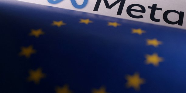 Le drapeau de l'union europeenne et du logo de meta[reuters.com]