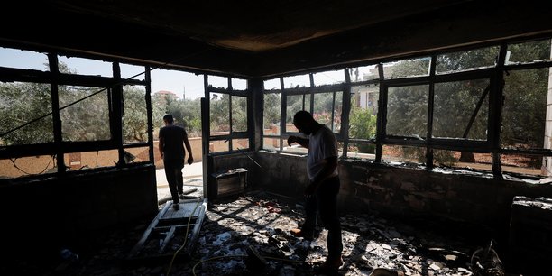 Un batiment incendie, apres une attaque de colons israeliens, pres de ramallah[reuters.com]