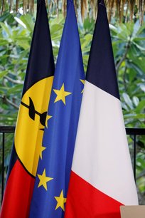 Les drapeaux de la nouvelle-caledonie, de l'union europeenne et de la france a la residence du haut-commissaire francais louis le franc a noumea[reuters.com]