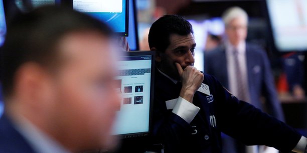 Un trader travaillant a la bourse de new york[reuters.com]