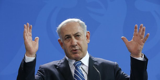 Israeli pm netanyahu gestures as he addresses a news conference at the chancellery in berlin[reuters.com]