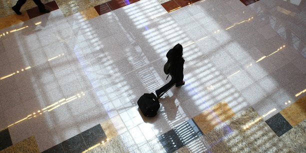 Un passager dans l'aeroport hartsfield-jackson d'atlanta[reuters.com]