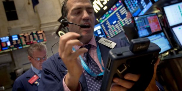 Wall Street finit en légère hausse après la Fed[reuters.com]