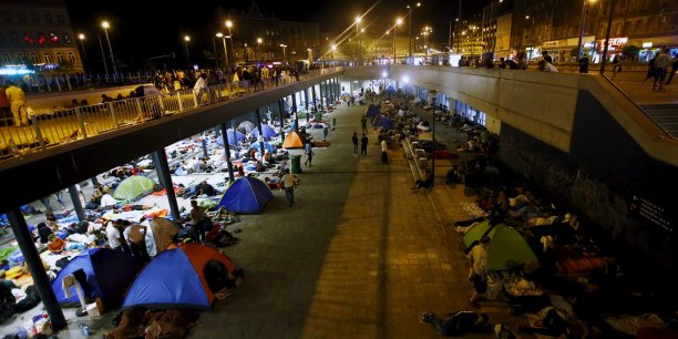 Refugees camp in front of the keleti train station in budapest[reuters.com]