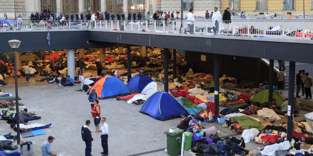 Paris et berlin veulent des quotas de refugies par pays europeen[reuters.com]