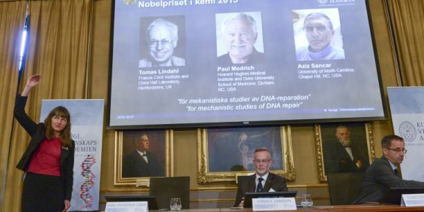 Professors sara snogerup linse, goran k. hansson and claes gustafsson, members of the nobel assembly, talk to the media at a news conference at the royal swedish academy in stockholm[reuters.com]