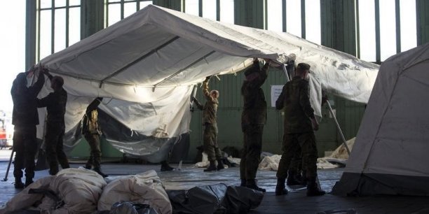 Echauffourees a berlin dans un centre d'accueil de refugies [reuters.com]
