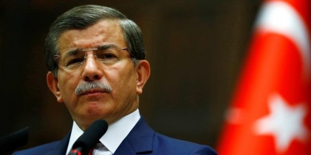 Turkey's prime minister ahmet davutoglu addresses members of parliament from his ruling ak party at the turkish parliament in ankara[reuters.com]