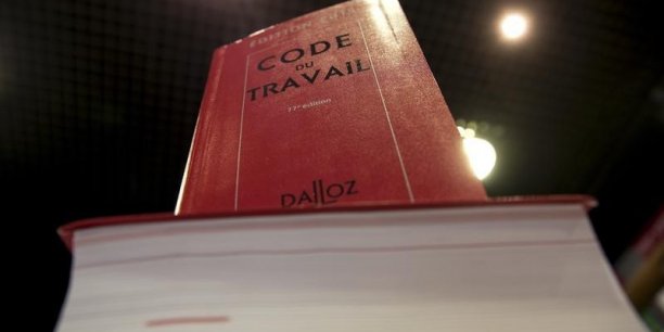 Copies of french labour code are displayed in a specialized bookshop in paris[reuters.com]