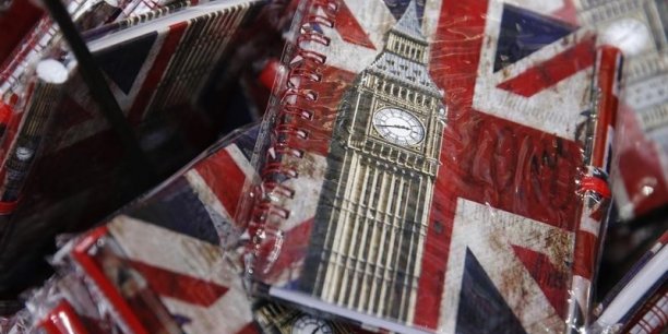Union flags and the big ben clocktower cover notebooks are seen on sale in london, britain[reuters.com]