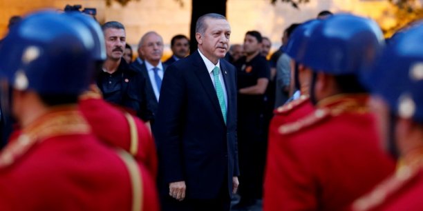 Turkish president tayyip erdogan reviews a guard of honour as he arrives to the turkish parliament in ankara[reuters.com]