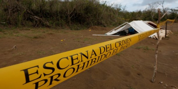 A police cordon marks the perimeter of the site where a forensic team and judicial authorities work in unmarked graves where skulls were found, on the outskirts of veracruz[reuters.com]