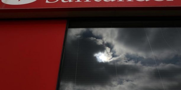 Banco santander: hausse de 14% du benefice net trimestriel[reuters.com]