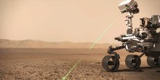 Illustration du rover Perseverance représentant un tir laser de l'instrument SuperCam. CNES/VR2Planet, 2021