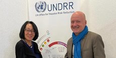 Alix Roumagnac, président de Predict Services, et la Japonaise Mami Mizutori, présidente de l'organisme onusien United Nations Office for Disaster Risk Reduction (UNDRR), lors de la COP 27 à Charm el-Cheikh, en novembre 2022.