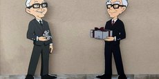 Des dessins façon cartoon de Charlie Munger et de Warren Buffett, vice-président et président de Berkshire Hathaway, à l'extérieur de Borsheims Fine Jewelry à Omaha (2018).