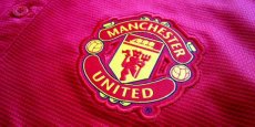 Le logo du célèbre club de football britannique Manchester United.