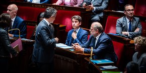 Gérald Darmanin, Gabriel Attal et Éric Dupond-Moretti à l’Assemblée nationale, le 21 mai.