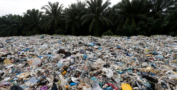 File photo: plastic waste is piled outside an illegal recycling factory in jenjarom, kuala langat