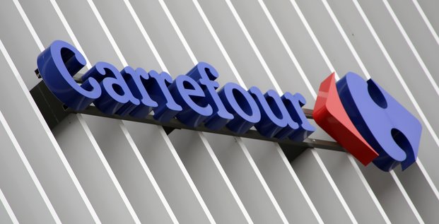 Carrefour accroit ses rachats d'actions apres la hausse de ses resultats au premier semestre