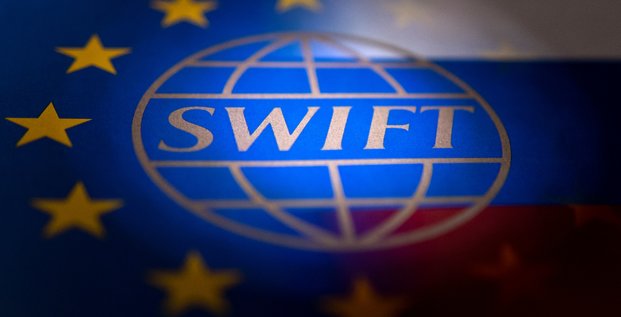Swift dit se preparer a se conformer aux restrictions imposees aux banques russes