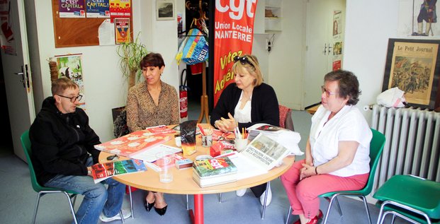 French cgt labour union members prepare the labour day protest at their local office in nanterre