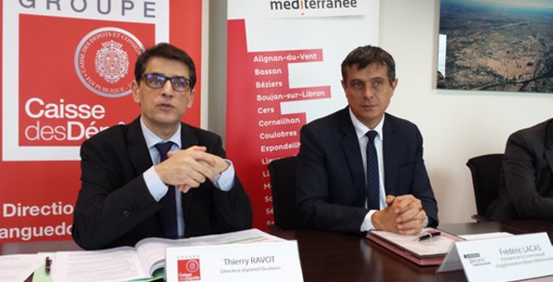 T. Ravot (Caisse des dépôts) et F. Lacas (Béziers Méditerranée) signent une convention partenariale