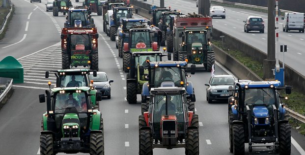 French farmers drive their tractors on the a7 highway to protest changes in underprivileged farm area’s mapping and against mercosur talks, in solaize