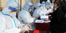 Coronavirus: en chine, les restrictions locales se multiplient