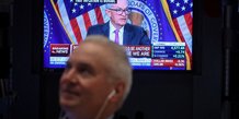 Les traders reagissent a l'annonce des taux d'interet de la fed sur le parquet de la bourse de new york