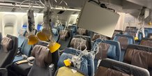 intérieur Singapore Airlines après turbulences 21 mai 2024